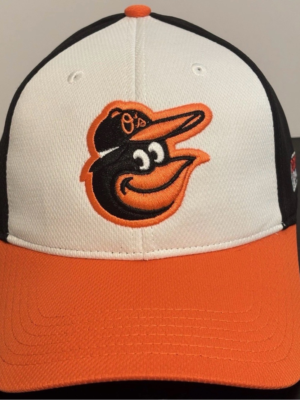 Orange and White Baseball Cap with Embroidered Mascot